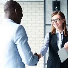 Man and woman shaking hands