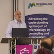 Speaker delivering a talk during Microbiology Society's Annual Conference