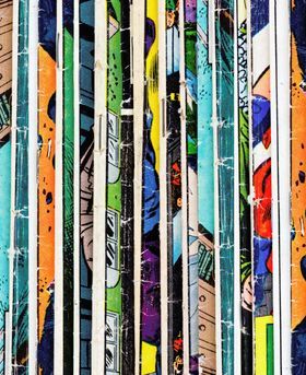 A mix of colourful comic books stacked vertically.