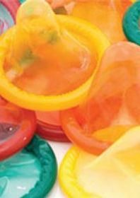 Multiple different coloured condoms.