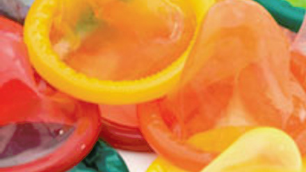 Multiple different coloured condoms.