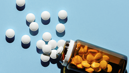 Bottle of white pills.