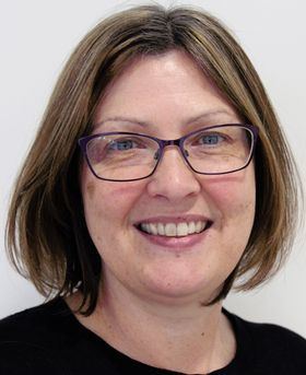 Headshot of Tracy Palmer.