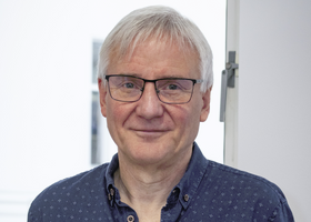 Headshot of Mark Buttner