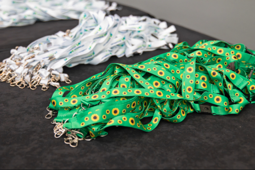 Microbiology Society lanyards and hidden disability sunflower lanyards on a table