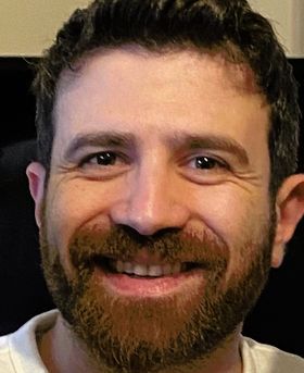 Headshot of Naji Bassil.