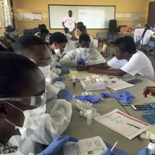 Group of microbiologists in a classroom.