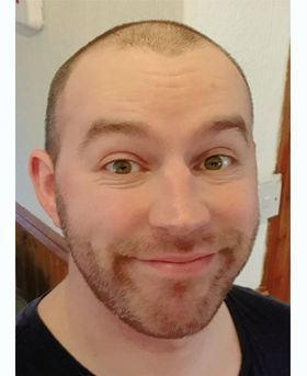Headshot of John Munnoch.