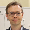 Headshot of James M