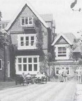 A garden view photo of Harvest House, the Society for General Microbiology's headquarters from 1971–1991