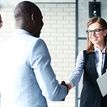 Two people shaking hands.