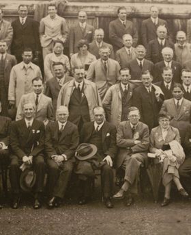 Close-up taken from group photo of delegates attending the Second International Congress of Microbiology.