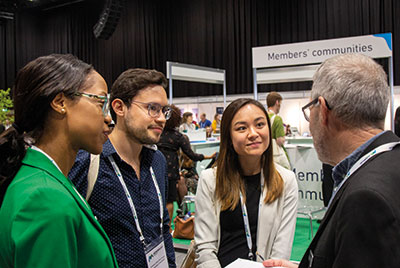 Delegates networking during an event
