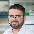 Headshot of Tasos Tsaousis.