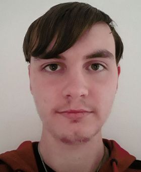 Headshot of Zac Newland Smith.